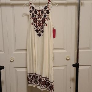 Cream dress with flower accents